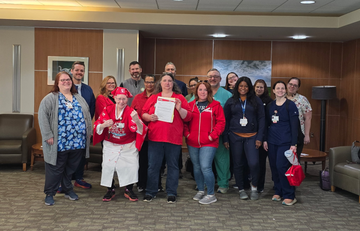 NYSNA members at Champlain Valley Physicians Hospital deliver an informational picket notice to management