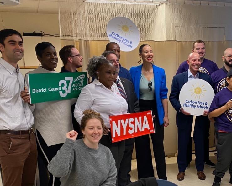 Union leaders from NYSNA, 32 BJ, DC 37 gather for a photo promoted Carbon Free and Healthy Schools