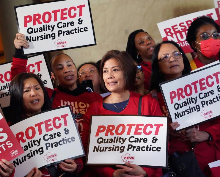 Nurses wearing NYSNA red at the Albany Statehouse 