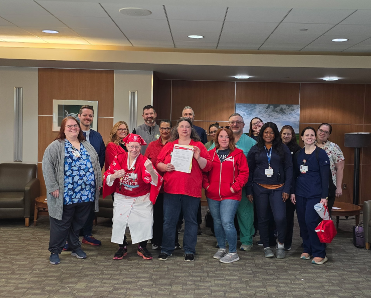 NYSNA members at Champlain Valley Physicians Hospital deliver an informational picket notice to management
