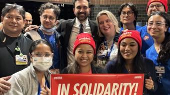 NYSNA members holding signs with NYC Mayor-elect Zohran Mamdani