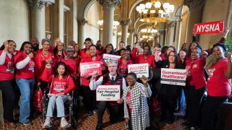 NYSNA nurses pose for a photo after their 2026 Lobby Day press conference
