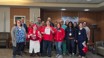 NYSNA members at Champlain Valley Physicians Hospital deliver an informational picket notice to management