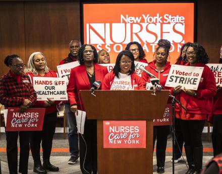 Nurses announcing the results of strike authorization votes across NYC