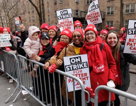 NYSNA nurses pose for a photo on the Mount Sinai strike line