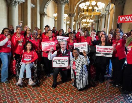 NYSNA nurses pose for a photo after their 2026 Lobby Day press conference